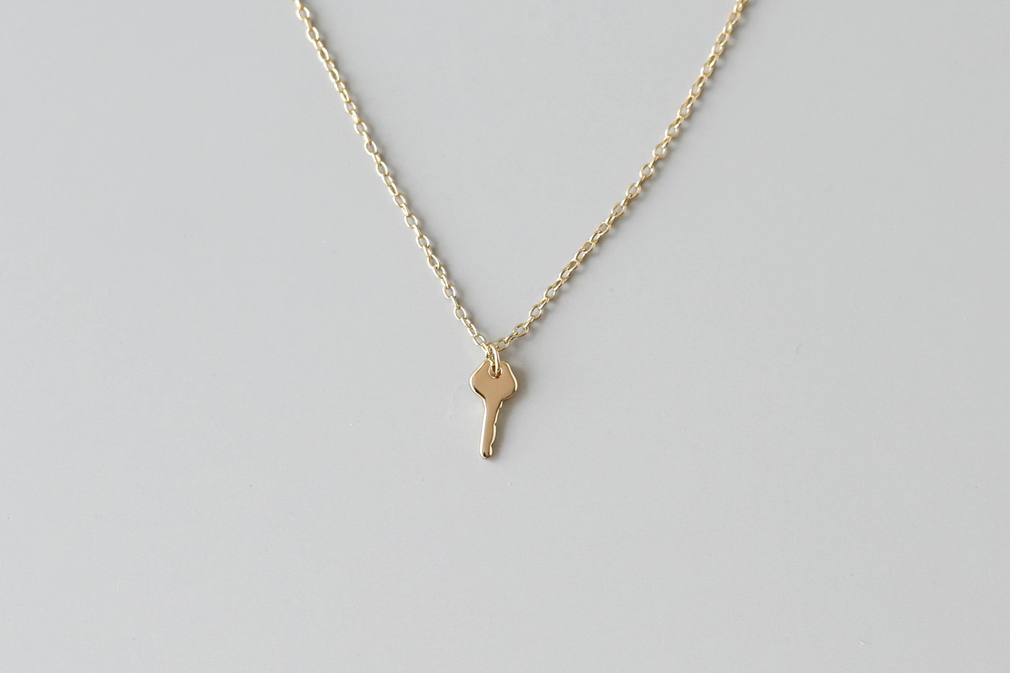 Gold Key to Letting Go Necklace