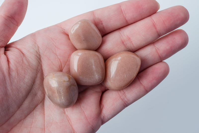 AAA Sunstone Tumbled Stone - Catalyst & Co